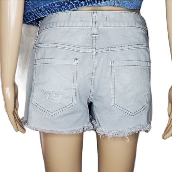 Free People Rugged Ripped Denim Shark Bite Shorts - Picture 7 of 13